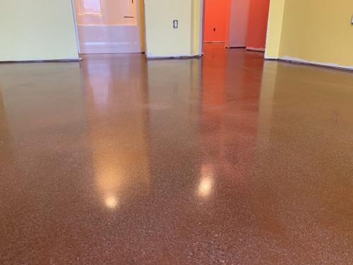 Medium Gloss Polished Concrete with terracotta red pigment.